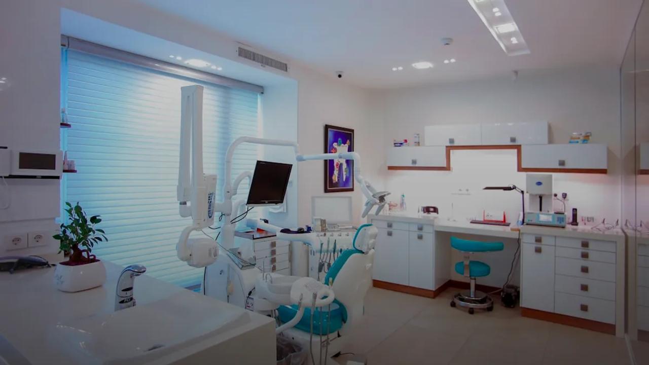 modern dental office with chair and equipment