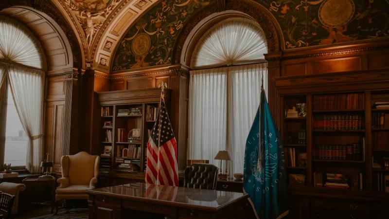 Grand office with flags and bookshelves