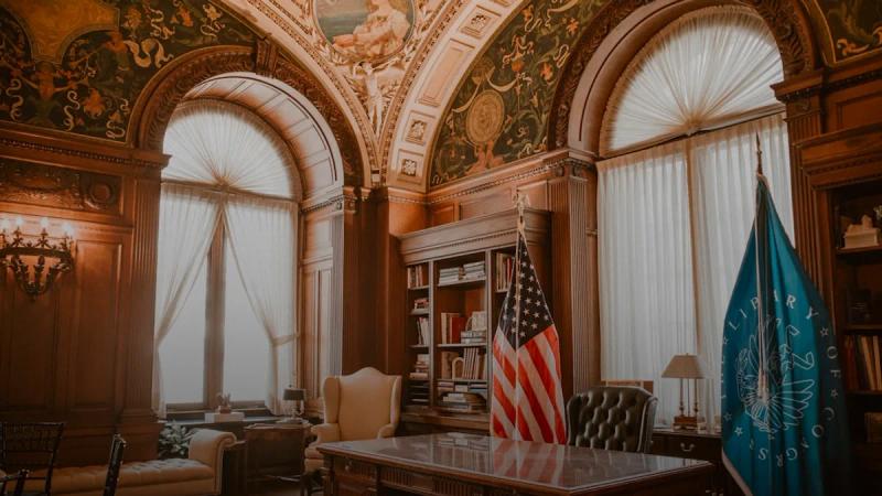Elegant office with american flag and presidential desk