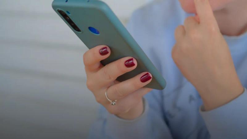 a person holding a cell phone