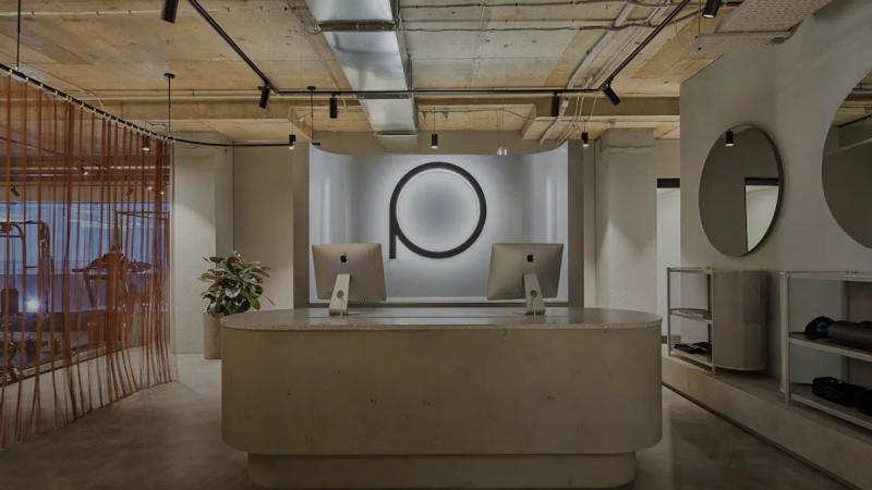Modern reception desk with minimalist decor and logo