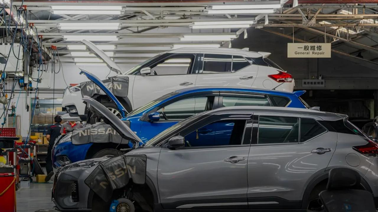 Cars being repaired in a workshop