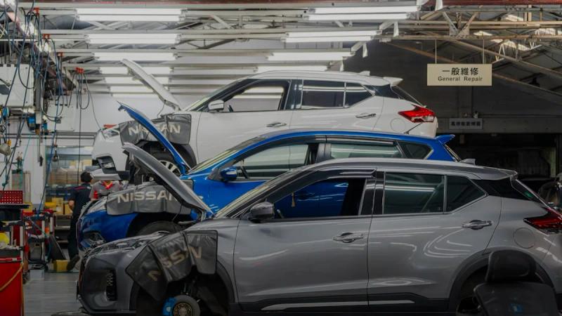 Cars being repaired in a workshop