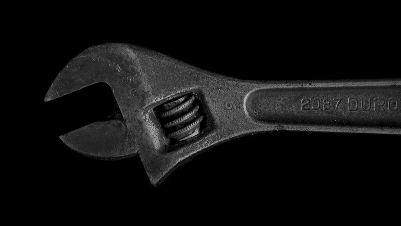 gray metal adjustable wrench