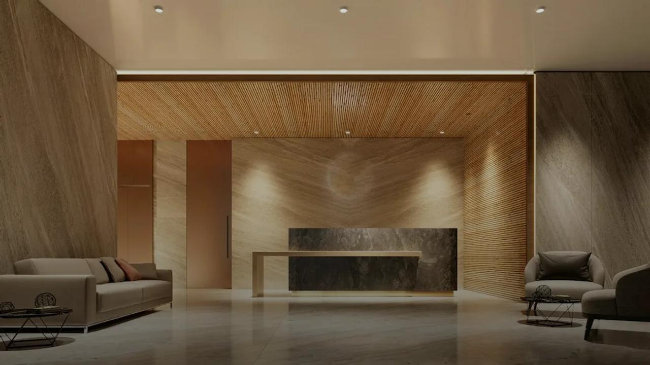 Modern lobby with reception desk and seating area
