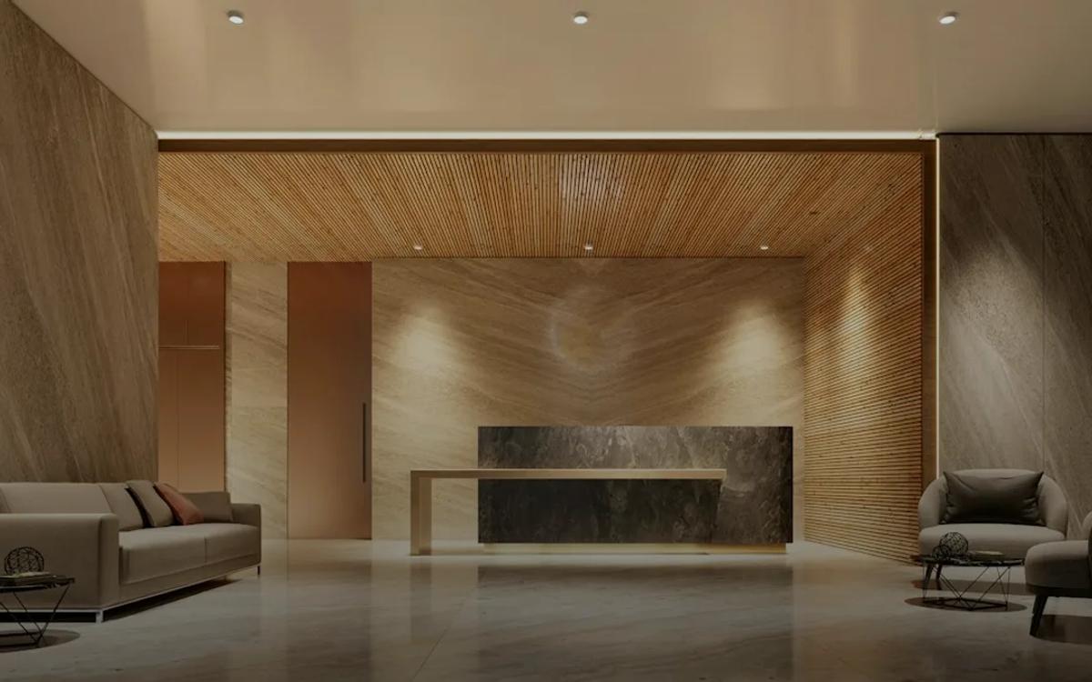 Modern lobby with reception desk and seating area