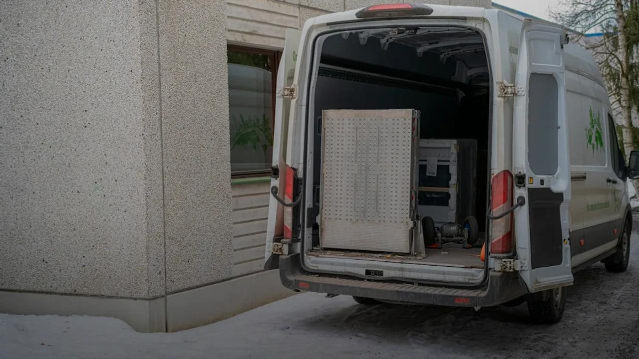 A delivery van with its back doors open
