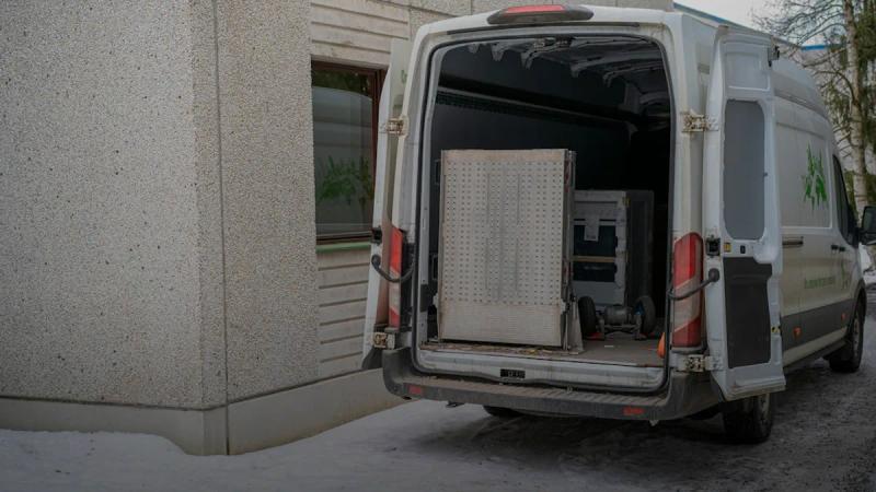 A delivery van with its back doors open
